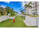 Artificial turf dog park with seating and water fountain at 3401 Bayshore Blvd # 1904, Tampa, FL 33629