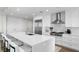 Spacious kitchen boasts white cabinets, stainless steel appliances, and a breakfast bar at 3401 Bayshore Blvd # 1904, Tampa, FL 33629