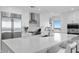 Modern white kitchen with stainless steel appliances at 3401 Bayshore Blvd # 1904, Tampa, FL 33629