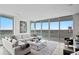 Bright living room features a sectional sofa, large windows, and stunning city views at 3401 Bayshore Blvd # 1904, Tampa, FL 33629