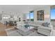 Spacious living room with sectional sofa, large windows, and city views at 3401 Bayshore Blvd # 1904, Tampa, FL 33629