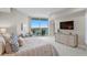 Luxurious main bedroom boasts a king-size bed and access to a private balcony at 3401 Bayshore Blvd # 1904, Tampa, FL 33629