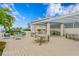 Outdoor patio with seating, tables, and grilling station at 3401 Bayshore Blvd # 1904, Tampa, FL 33629