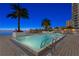 Evening view of resort-style pool with city views at 3401 Bayshore Blvd # 1904, Tampa, FL 33629
