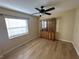 Bright bedroom with wood floors and built-in hutch at 3969 106Th N Ave, Clearwater, FL 33762