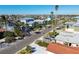 Aerial view of waterfront homes with boat docks and lush landscaping at 545 Lillian Dr, Madeira Beach, FL 33708