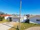 Aerial view of single-story home with garage at 545 Lillian Dr, Madeira Beach, FL 33708