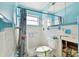 A small bathroom with shower/tub combo and vintage tile needing renovation at 545 Lillian Dr, Madeira Beach, FL 33708