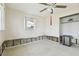 Needs renovation, this bedroom features a ceiling fan and a closet at 545 Lillian Dr, Madeira Beach, FL 33708