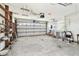 Large garage with ample storage shelves and overhead storage at 545 Lillian Dr, Madeira Beach, FL 33708