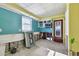 A fixer-upper kitchen with damaged walls and flooring, ready for renovation at 545 Lillian Dr, Madeira Beach, FL 33708