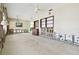 Living room requiring renovation, features built-in shelving at 545 Lillian Dr, Madeira Beach, FL 33708