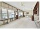 Large living room with water views and wood built-ins at 545 Lillian Dr, Madeira Beach, FL 33708