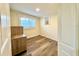 Bright bedroom with wood-look flooring and ample natural light at 5626 28Th S Ave, Gulfport, FL 33707