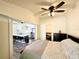 Bedroom with view of kitchen and modern ceiling fan at 5626 28Th S Ave, Gulfport, FL 33707
