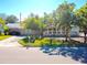 Charming light green house with a spacious front yard and mature trees at 5626 28Th S Ave, Gulfport, FL 33707