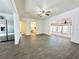 Open living area with tile floors and a ceiling fan at 5626 28Th S Ave, Gulfport, FL 33707