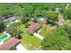 Aerial view showing single-story home, spacious yard, and neighborhood context at 605 Greenbriar Dr, Brandon, FL 33511