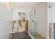 Bathroom with a frameless glass shower and subway tile at 6604 Blue Heron S Dr, St Petersburg, FL 33707