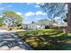 Side view of the house, highlighting the backyard and fence at 4666 Helena Ne St, St Petersburg, FL 33703