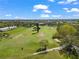 Aerial view of a green golf course at 2330 Ecuadorian Way # 30, Clearwater, FL 33763