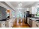 Modern kitchen with stainless steel appliances, breakfast nook, and view to other rooms at 37439 Meridian Ave, Dade City, FL 33525