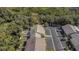 Aerial view showcasing a townhouse and its surrounding landscape at 381 Estero Ct, Safety Harbor, FL 34695