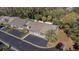 Aerial view of a home with a car parked in the driveway at 381 Estero Ct, Safety Harbor, FL 34695