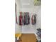 Walk-in closet with ample hanging and shelving space at 381 Estero Ct, Safety Harbor, FL 34695