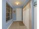 Light and airy entryway with tile floors and window, leading to the interior at 381 Estero Ct, Safety Harbor, FL 34695