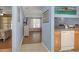 View from kitchen down hallway to bedroom and living room at 381 Estero Ct, Safety Harbor, FL 34695