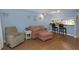 Cozy living room featuring comfortable seating and convenient kitchen access at 381 Estero Ct, Safety Harbor, FL 34695