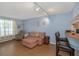 Comfortable living room with plush seating and convenient access to kitchen bar area at 381 Estero Ct, Safety Harbor, FL 34695
