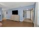 Open living space with view to entry way and showing tv with convenient access to other parts of the home at 381 Estero Ct, Safety Harbor, FL 34695