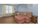 Comfortable living room with plush seating, natural lighting, and modern decor at 381 Estero Ct, Safety Harbor, FL 34695
