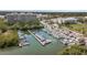 An aerial view of a marina with numerous boats and waterfront property at 381 Estero Ct, Safety Harbor, FL 34695