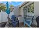 Outdoor patio featuring a fire pit table, seating, and gravel landscaping at 381 Estero Ct, Safety Harbor, FL 34695