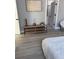 Bedroom shelving unit with three levels of shelving and decorative items at 4202 N 15Th St, Tampa, FL 33610