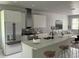 Open concept kitchen, featuring stainless steel appliances and an island at 4202 N 15Th St, Tampa, FL 33610