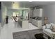 Modern kitchen with island, stainless steel appliances, and open concept layout at 4202 N 15Th St, Tampa, FL 33610