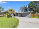 House exterior with driveway and landscaping at 4231 Shore Acres Ne Blvd, St Petersburg, FL 33703