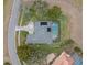 Overhead view of the house, pool, and landscaping at 4351 Mallard Lake Dr, Spring Hill, FL 34609