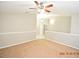 Bright bedroom with ceiling fan and access to another room at 504 Maple Pointe Dr, Seffner, FL 33584