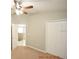 Bright bedroom with ceiling fan and double door closet at 504 Maple Pointe Dr, Seffner, FL 33584