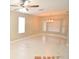 Open living area with tile floors and neutral color scheme at 504 Maple Pointe Dr, Seffner, FL 33584