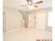 Living room with staircase, tile floor, and neutral decor at 504 Maple Pointe Dr, Seffner, FL 33584