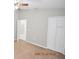 Bedroom with neutral walls, carpet flooring, and double door closet at 504 Maple Pointe Dr, Seffner, FL 33584