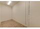 Large empty storage room with tiled floor at 5418 Oakhurst Dr, Seminole, FL 33772