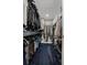 Walk-in closet with ample shelving and hanging space at 5805 Grand Sonata Ave, Lutz, FL 33558