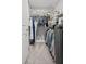 Well-organized walk in closet with shelving and hanging space at 5805 Grand Sonata Ave, Lutz, FL 33558